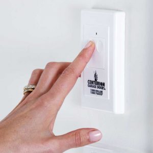 Garage door wall remote buttons