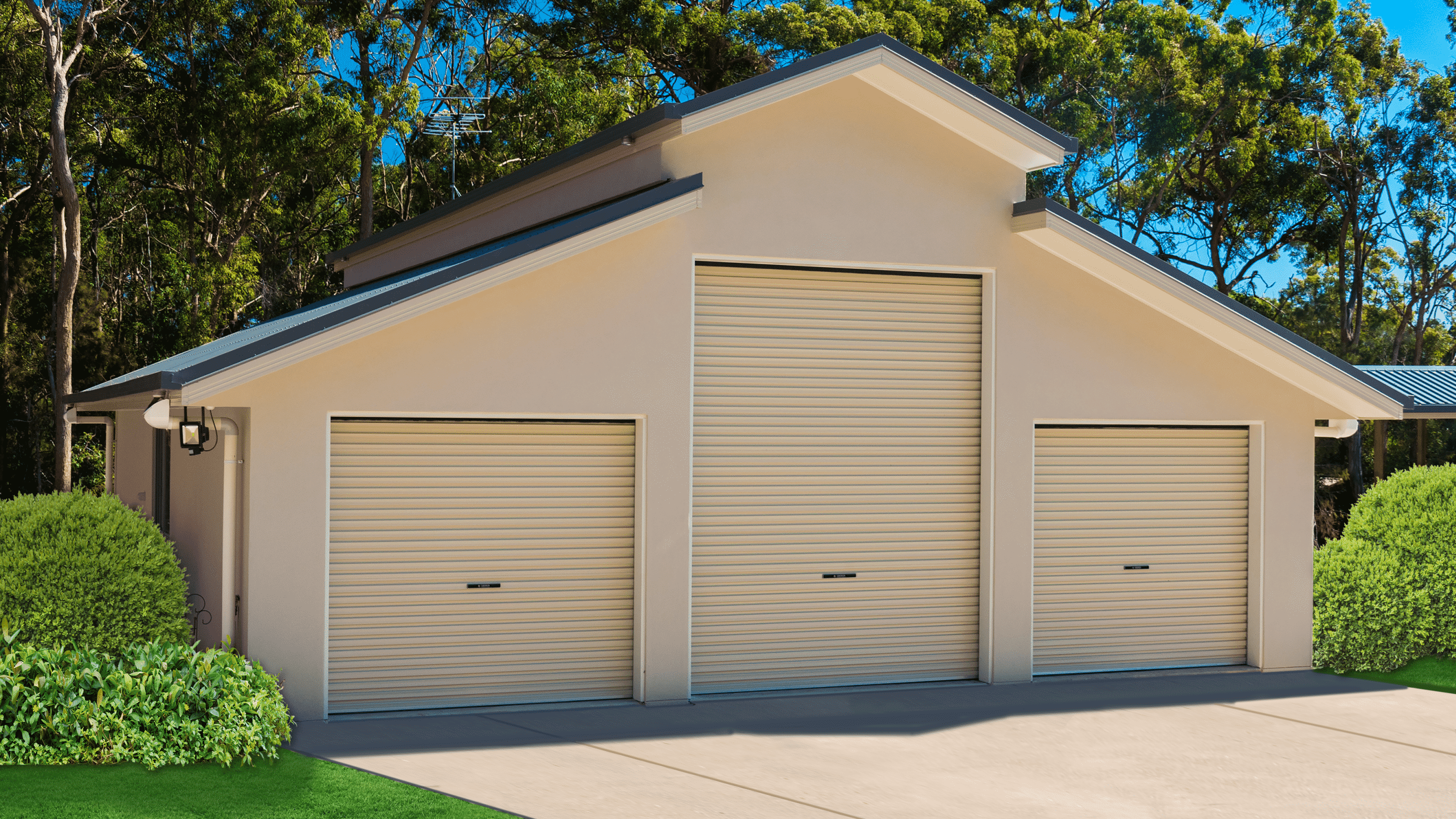 House with three Centurion Roller Doors