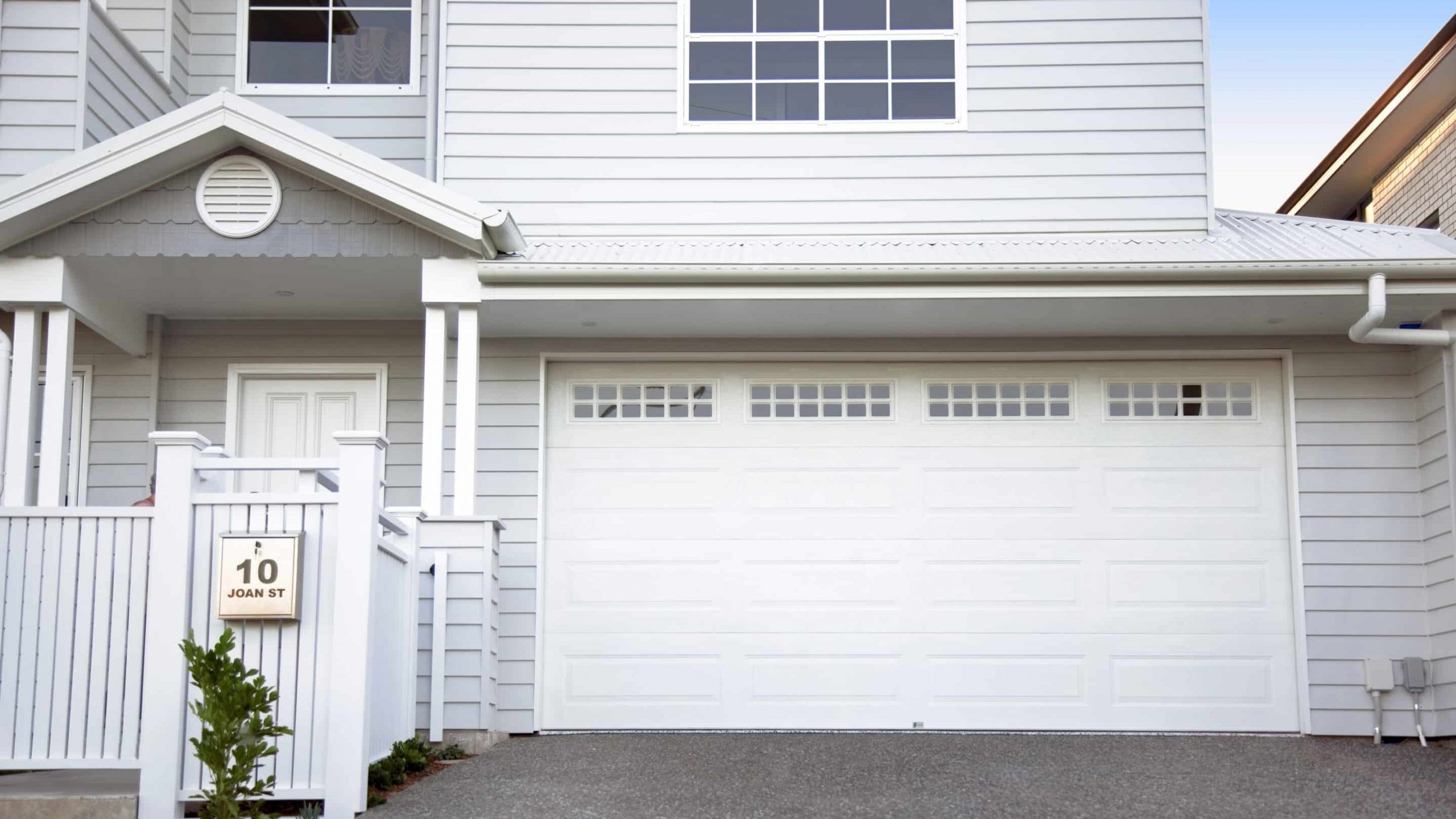 Centurion Hamptons White Garage Door on a Large House