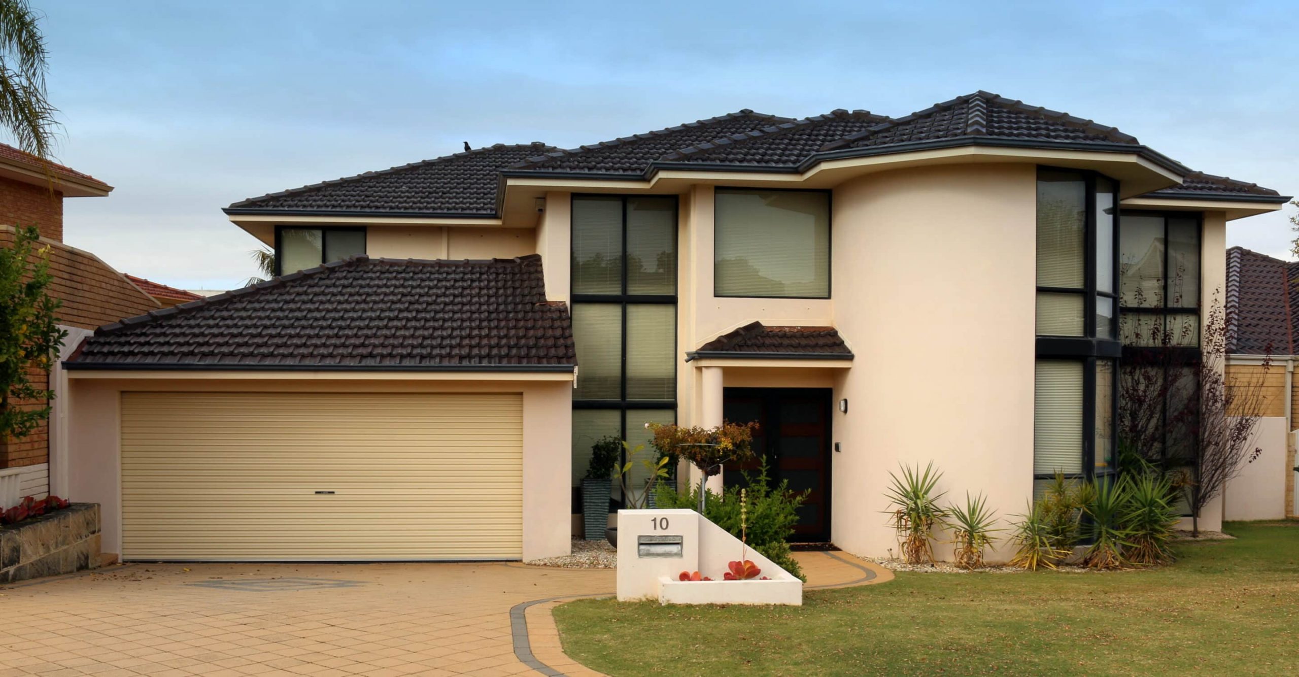 House with automatic garage roller door